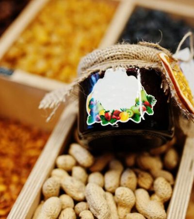 hommemade-jar-with-jam-with-peanuts-shelf-supermarket-grocery-store_627829-8308
